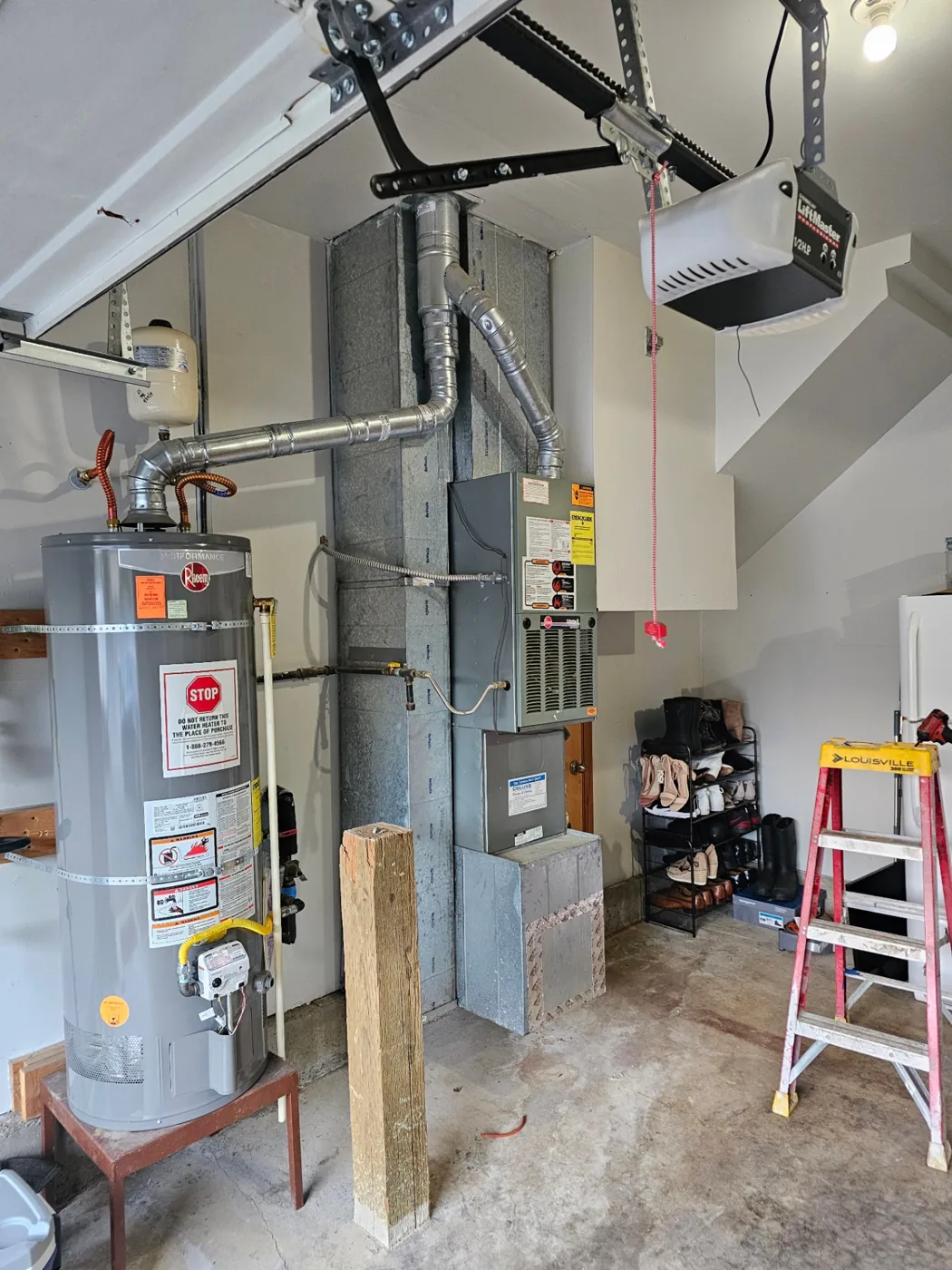 Garage furnace and water heater installation with sheet metal venting in Vancouver, Washington