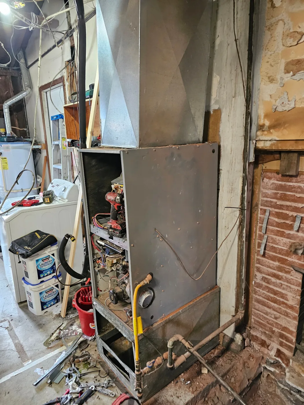 Existing basement furnace cabinet prior to service or replacement in Vancouver, WA