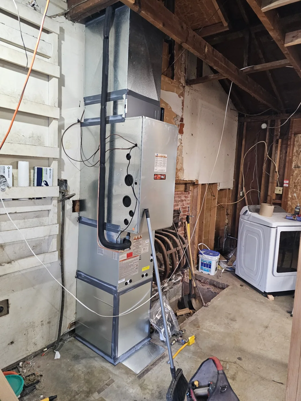 RunTru high-efficiency furnace and coil with PVC venting installed in a Vancouver, WA utility room